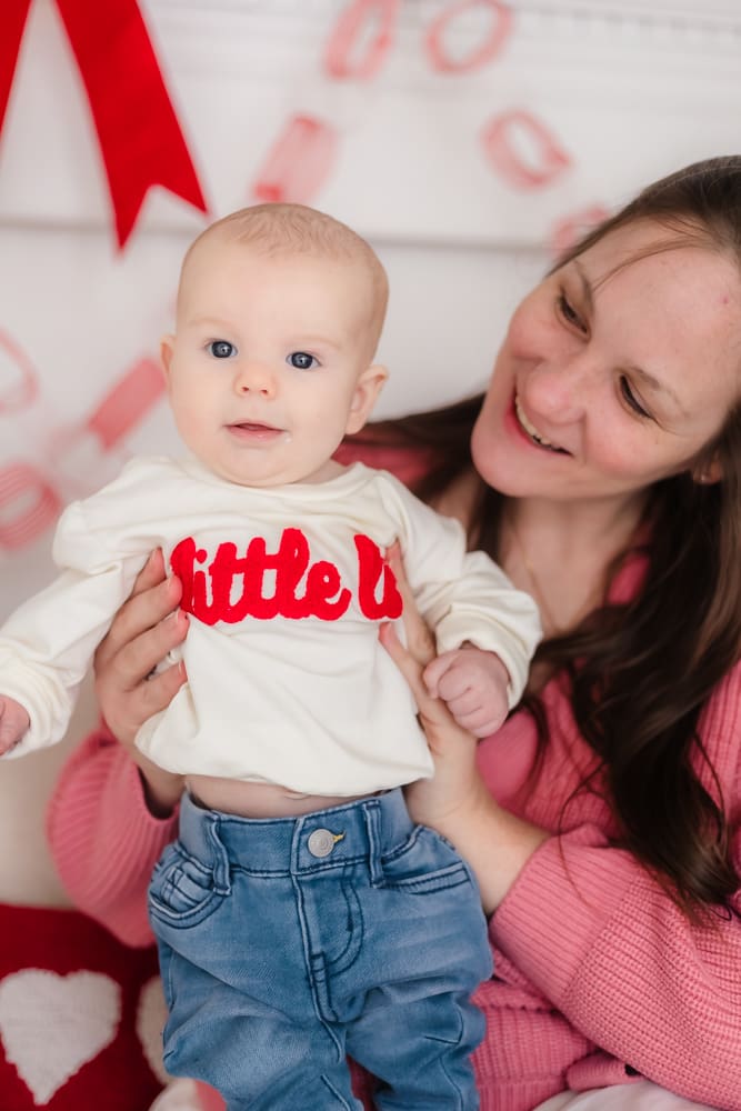 mom playing with baby during valentine's themed 3 month milestone photography session in knoxville tn
