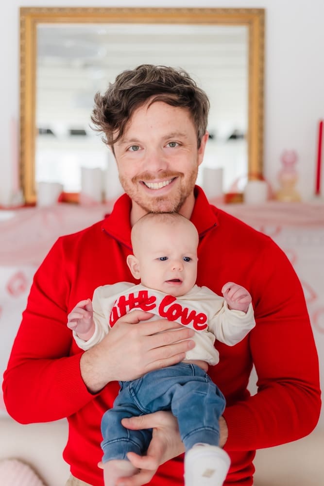 dad holding baby during valentine's themed 3 month milestone photography session in knoxville tn