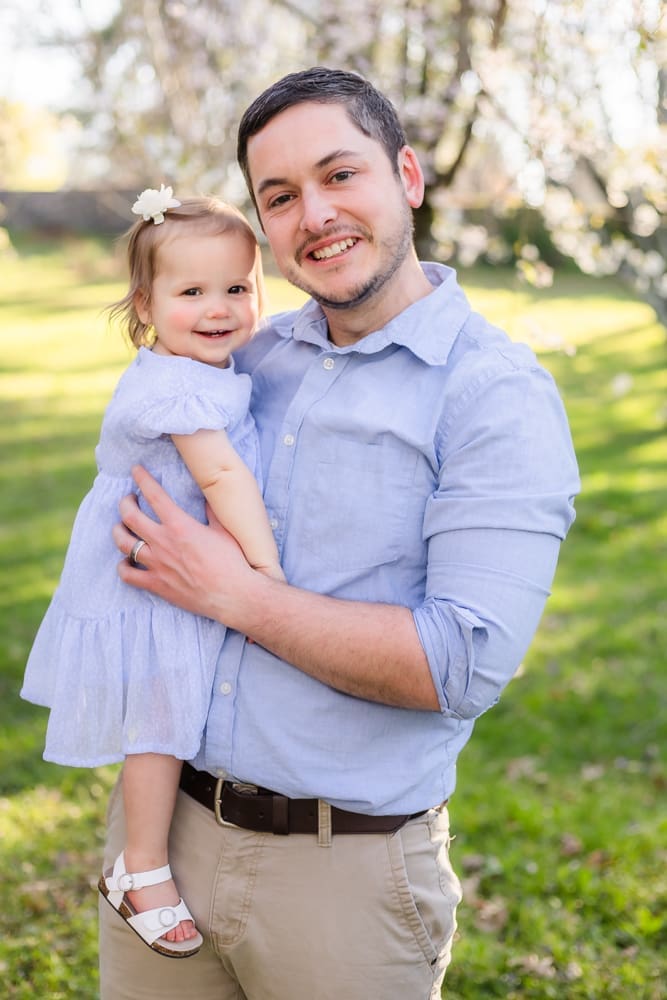 dad and little girl smile during maternity photography session in knoxville tn
