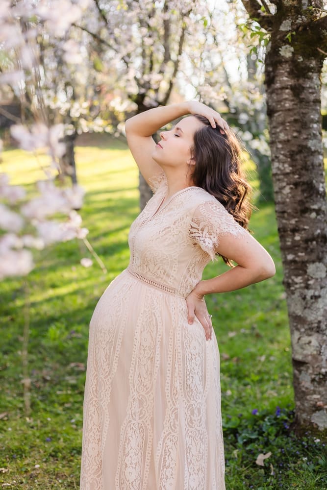mom during maternity photography session in knoxville tn