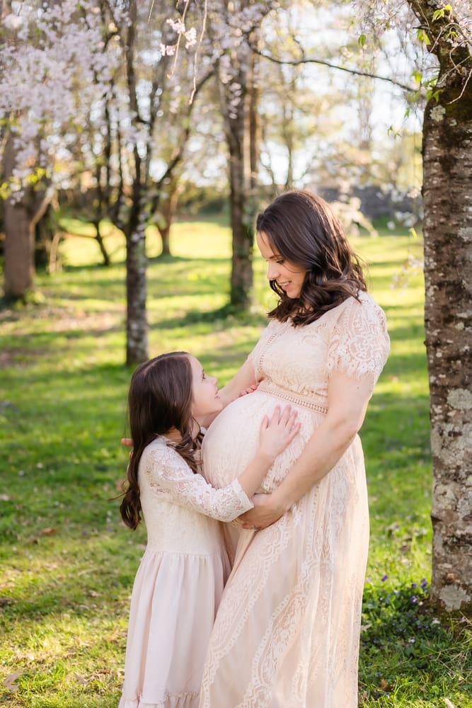 mom and oldest daughter during maternity photography session in knoxville tn
