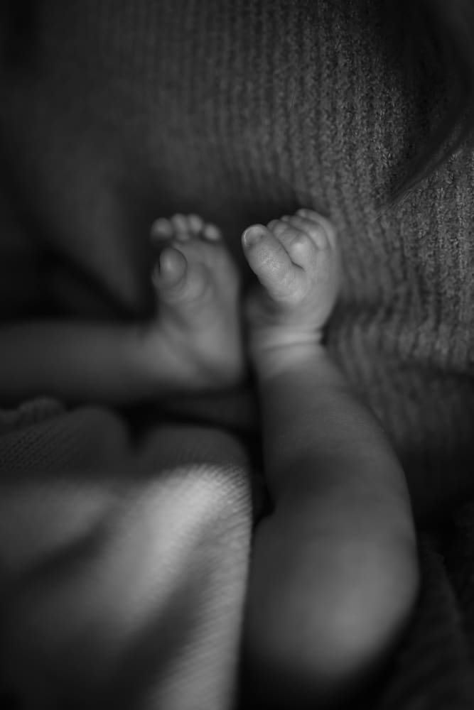 details of newborn toes during in-home lifestyle newborn session by knoxville newborn and maternity photographer Kelsey Wood Portraits.