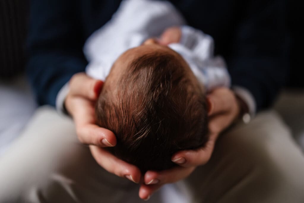 newborn's head during in-home lifestyle newborn photography session in knoxville tn