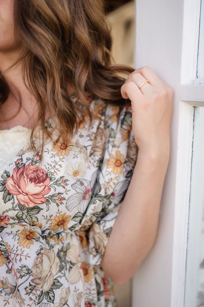 detail of wedding ring during knoxville maternity photography session at the Holmstead studio