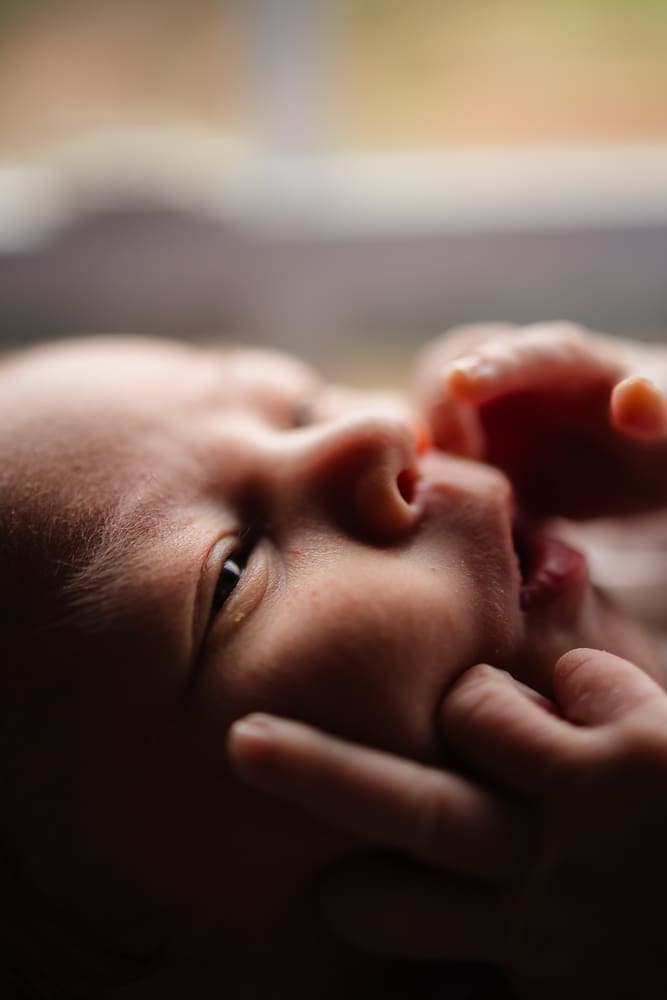 detail of newborn eyes during knoxville in-home lifestyle newborn photography session