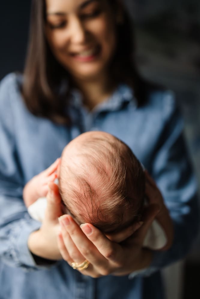 detail shot of baby's hair during knoxville in-home lifestyle newborn photography session