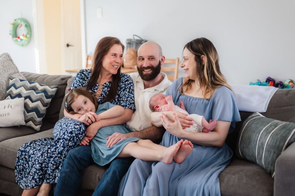 lifestyle newborn session with grandma and family of 4